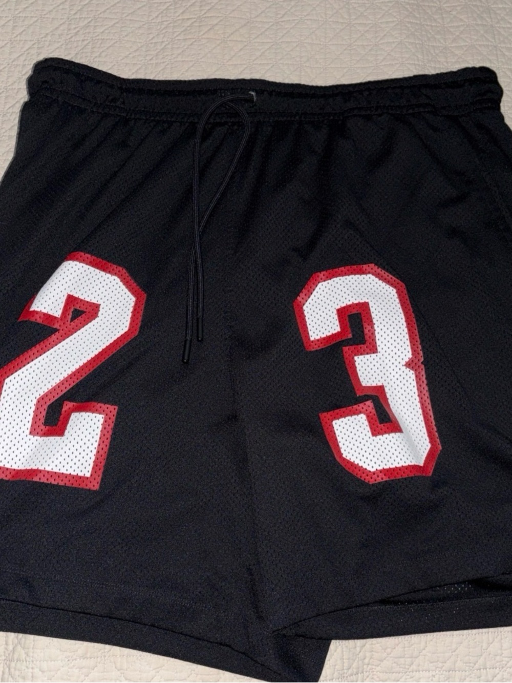 Jordan Black Athletic Mesh Shorts with White and Red Numbering